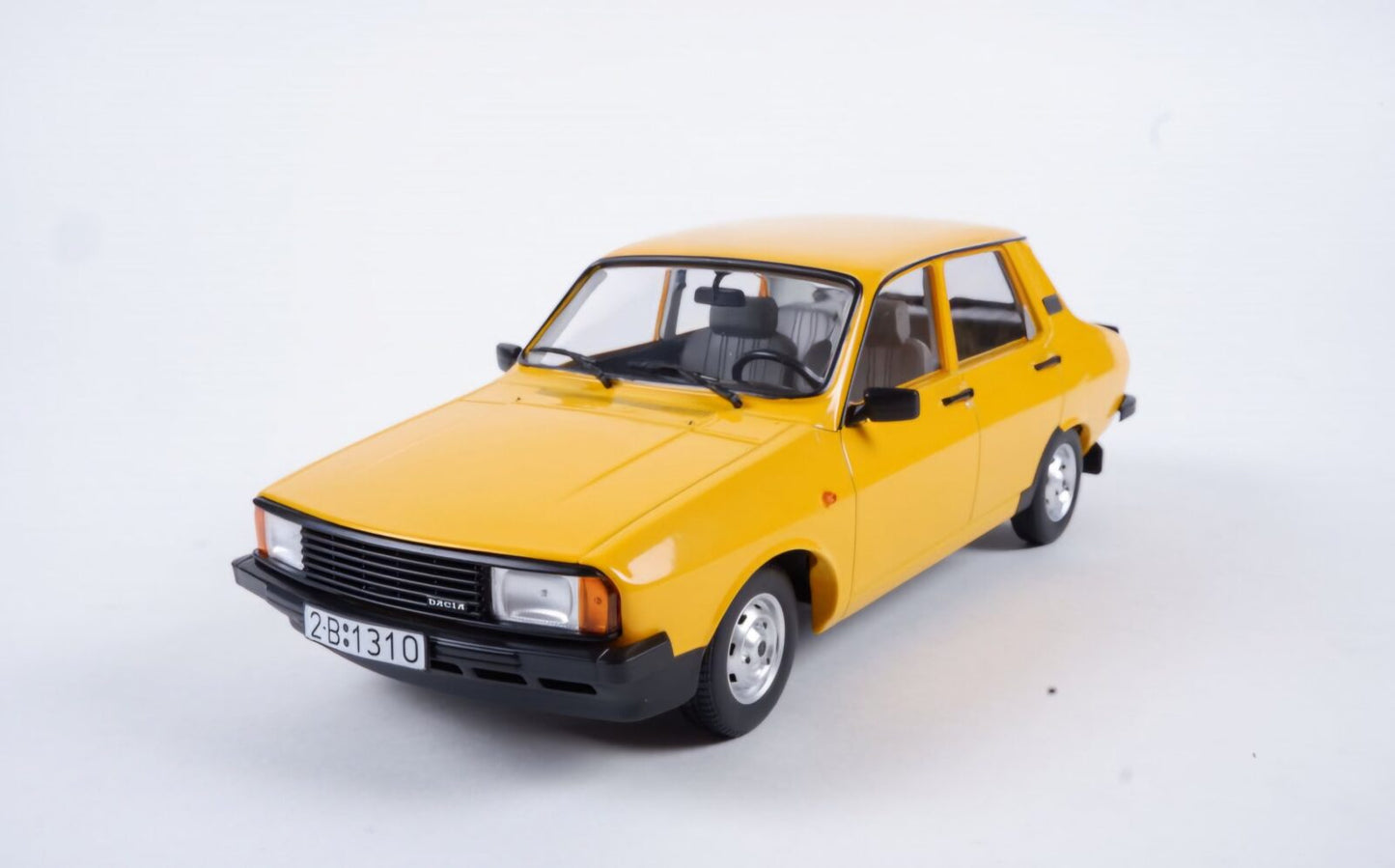 Dacia 1310 L 1993 (galbena) - 1/18 Triple9