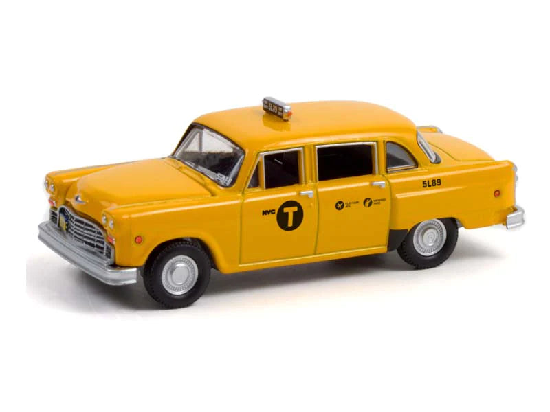 Checker Taxi 1974 "John Wick" cu vitrina plexiglass - 1/43 Greenlight