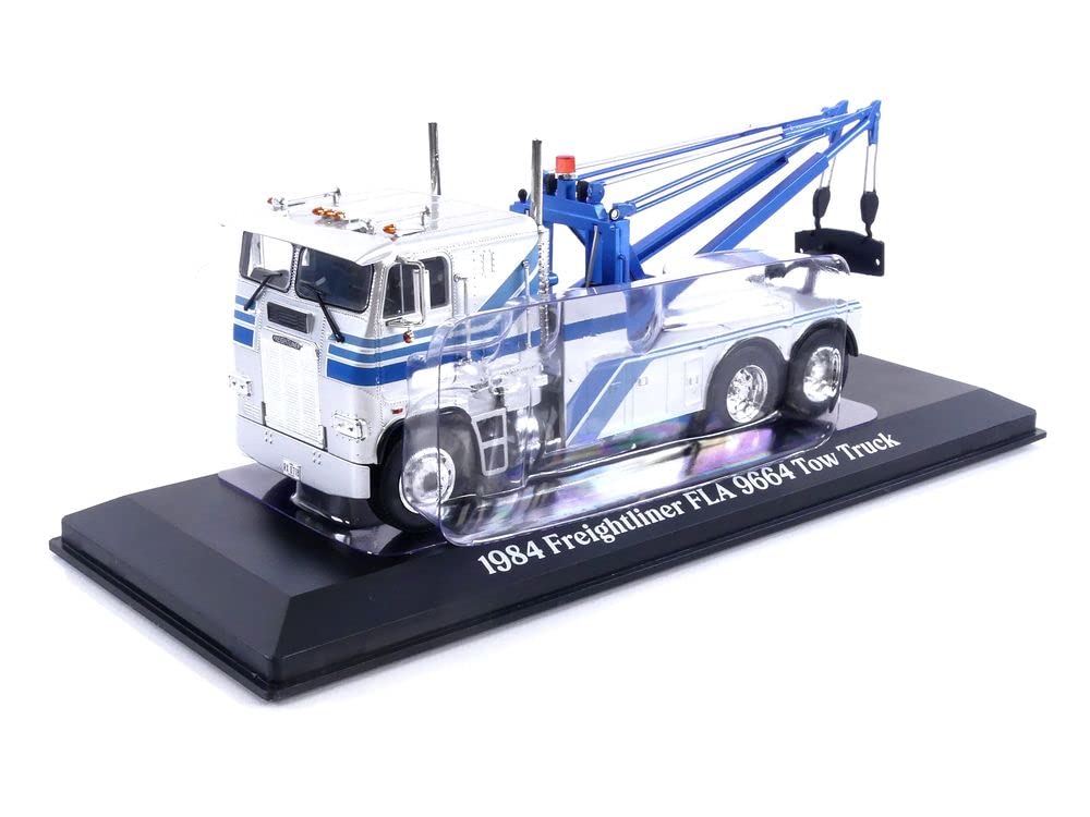 Camion Freightliner FLA 9664 Tow Truck 1984 argintiu/albastru cu vitrina plexiglass - 1/43 Greenlight