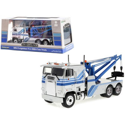 Camion Freightliner FLA 9664 Tow Truck 1984 argintiu/albastru cu vitrina plexiglass - 1/43 Greenlight