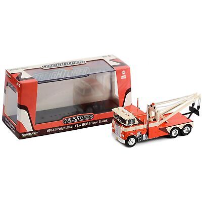 Camion Freightliner FLA 9664 Tow Truck 1984 portocaliu/crem cu vitrina plexiglass - 1/43 Greenlight